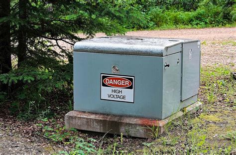 green electric box in my yard|green transformer box.